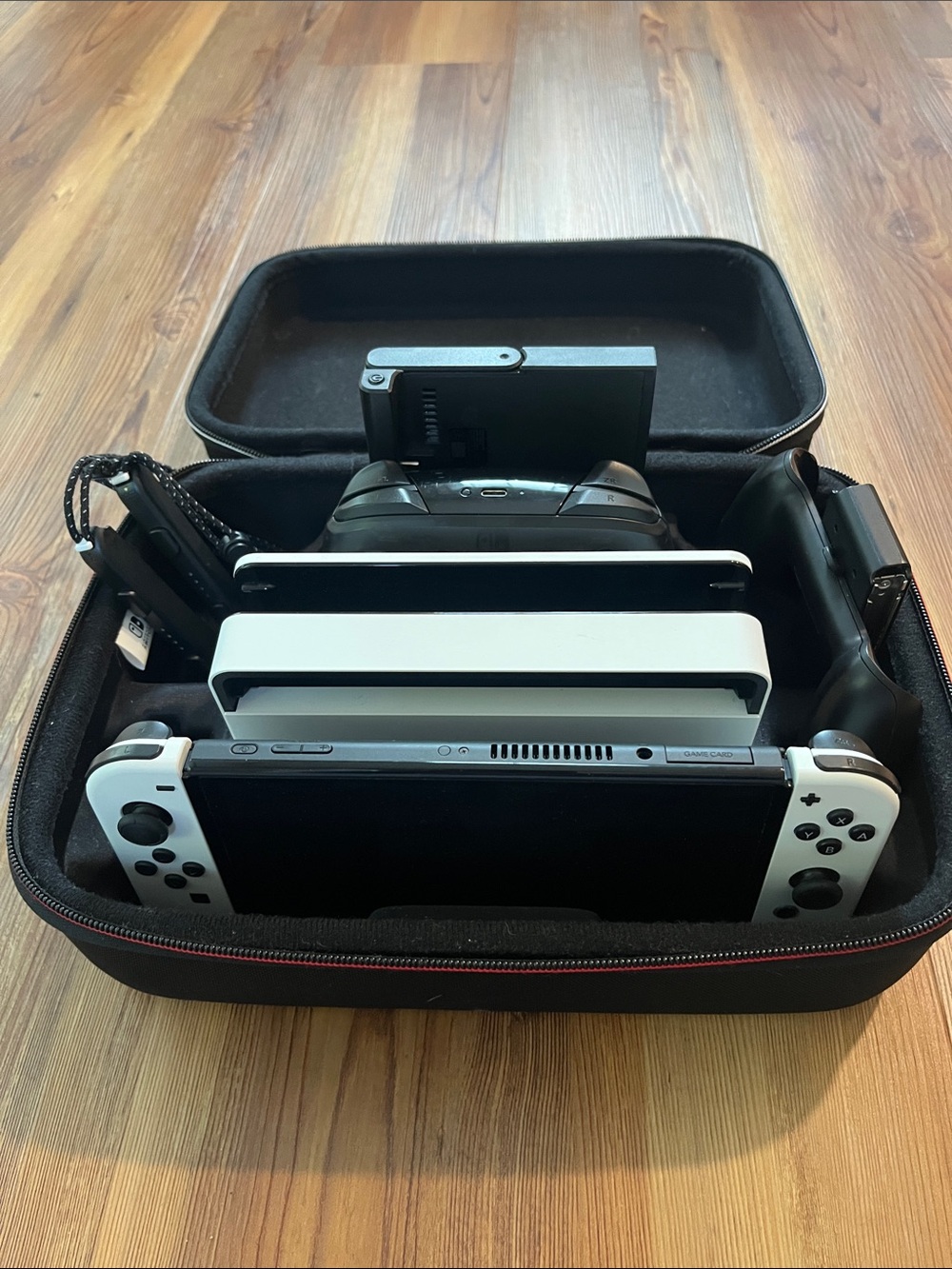 Nintendo Switch OLED Console with White Joy-Con Controllers Bundle